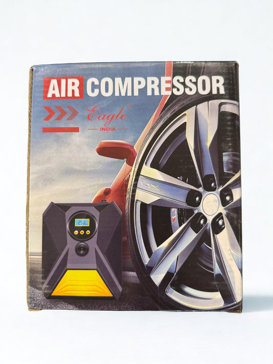 Box of an air compressor with a tire and car in the background