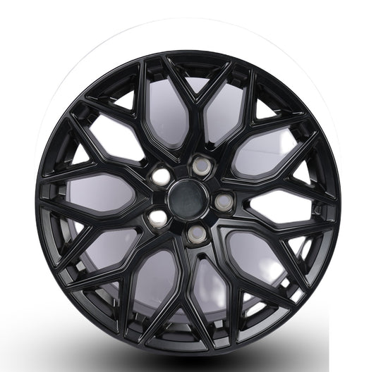 Black alloy wheel on a white background