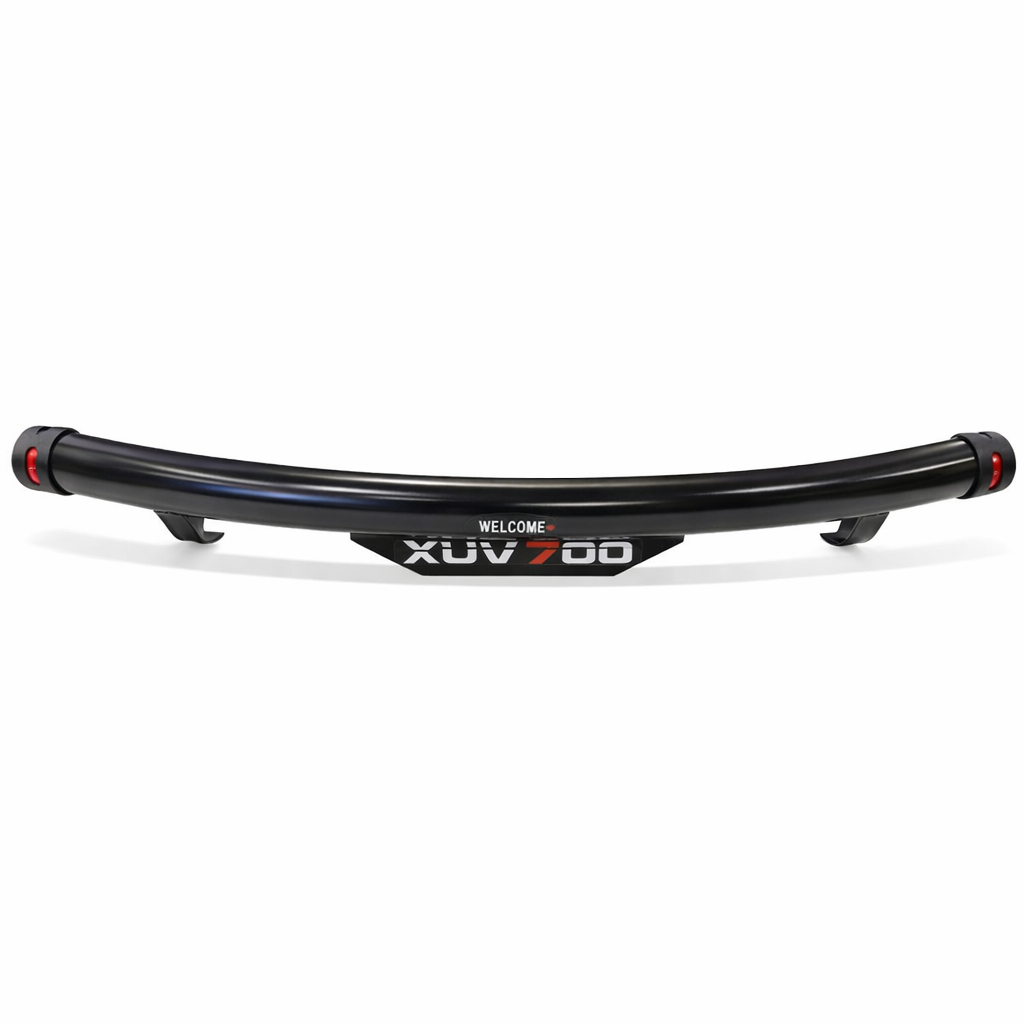Black metal leaf spring with 'WELCOME XUV 700' text on a white background