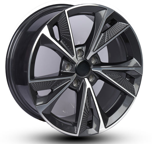 Black alloy wheel with a shiny finish on a white background
