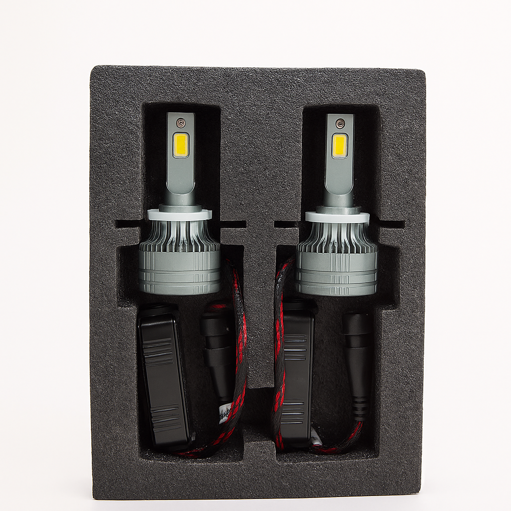 Two car LED headlights in a black foam packaging on a white background