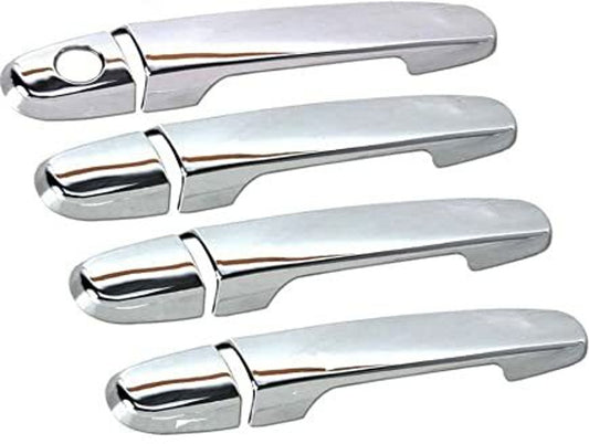 Set of four chrome car door handles on a white background