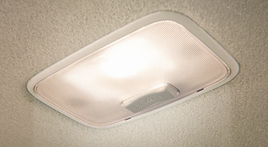 Ceiling light fixture on a beige ceiling