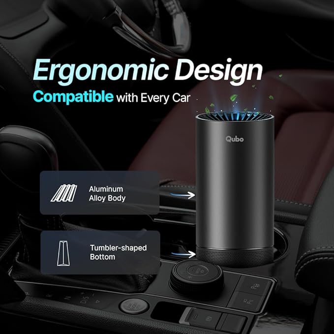 Car air freshener with ergonomic design and tumbler-shaped bottom, placed in a car cup holder.