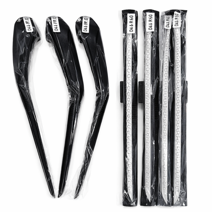 Set of black hair clips and clear plastic rulers with visible branding on a white background