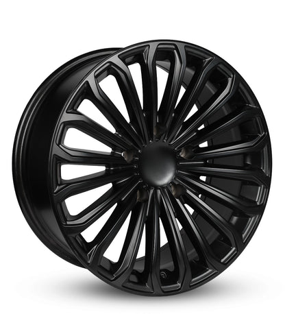 Black alloy wheel on a white background