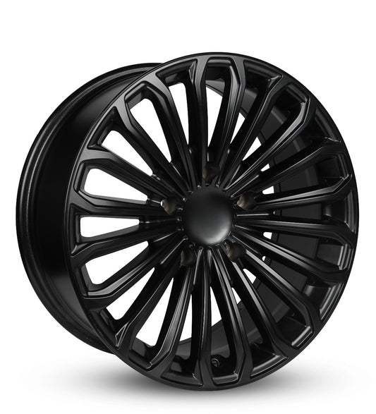 Black alloy wheel on a white background
