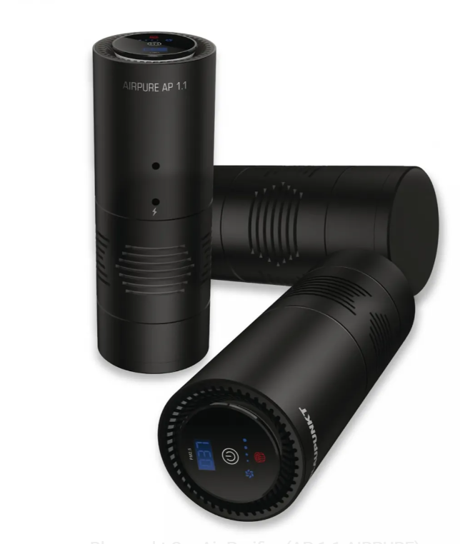 Black cylindrical air purifiers on a white background