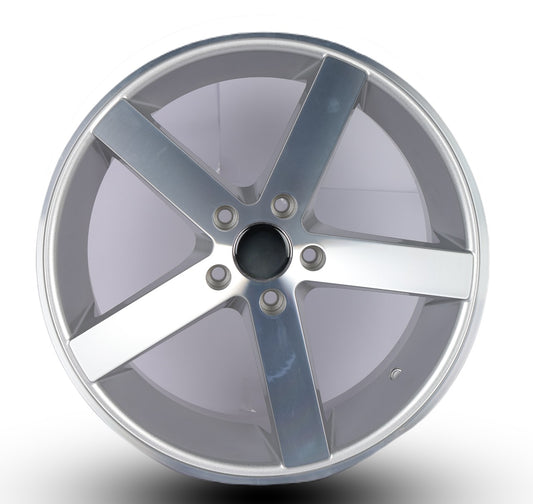 Silver alloy wheel on a white background