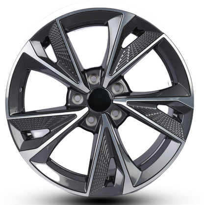 Car wheel rim with a black and silver design on a white background