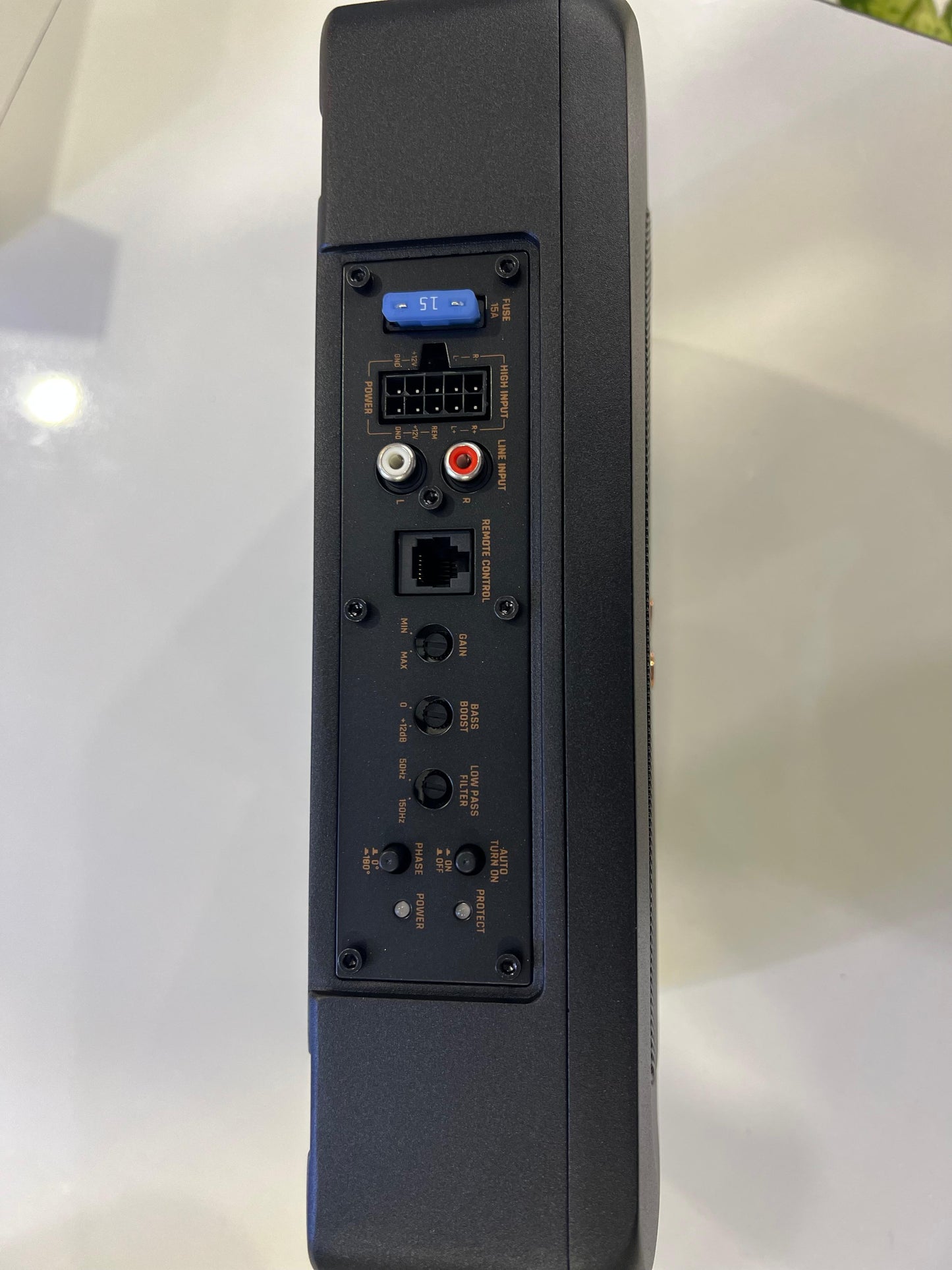 Back view of a electronic device with various ports on a white background