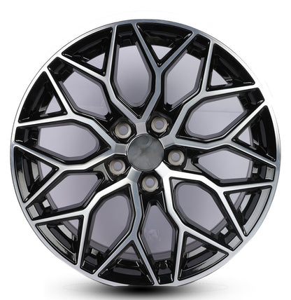 Black alloy wheel rim on a white background