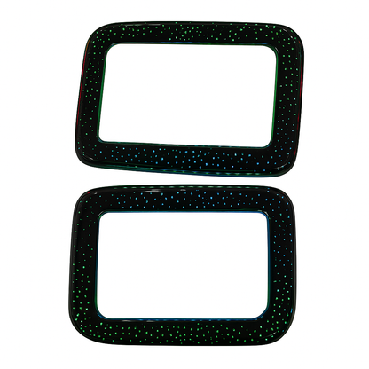 Two black rectangular frames with speckled pattern on a white background