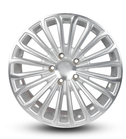 Silver car wheel rim on a white background