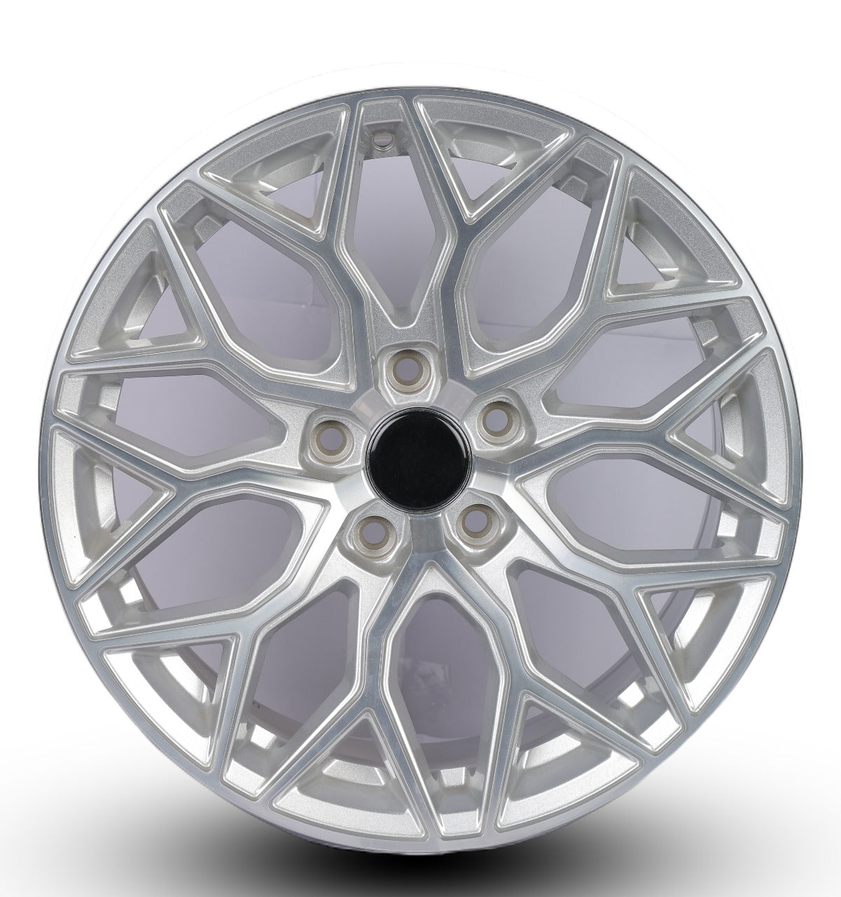 Silver alloy wheel rim on a white background