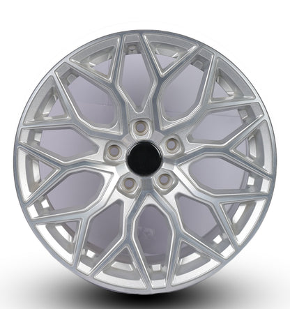 Silver alloy wheel rim on a white background