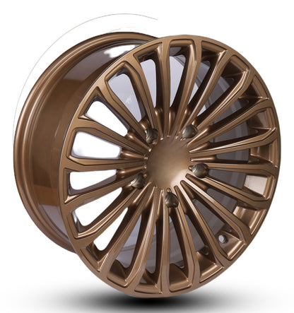 Bronze alloy wheel rim on a white background