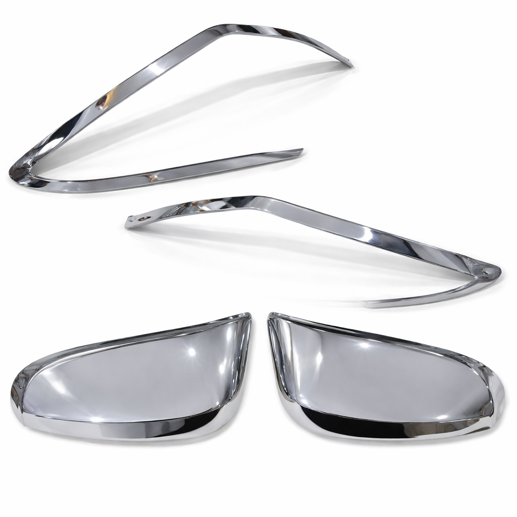 Set of chrome car mirror covers on a white background