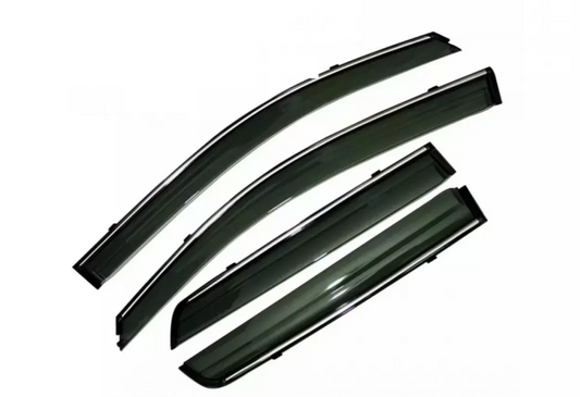 Set of four car window deflector rain guards on a white background