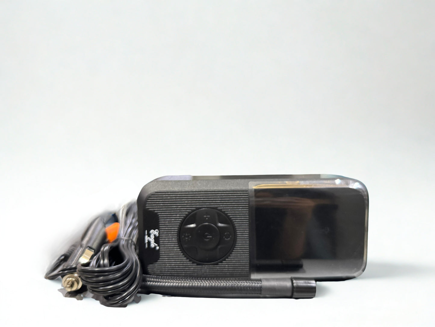Black electronic device with a cable on a white background