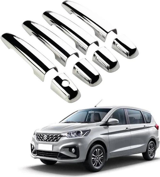 Set of chrome car door handles above a silver car on a white background