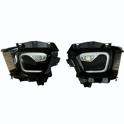 Pair of black car fog lights on a white background