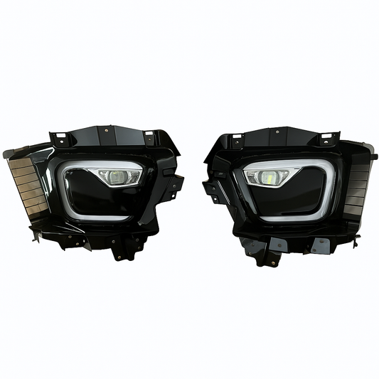 Pair of black car fog lights on a white background