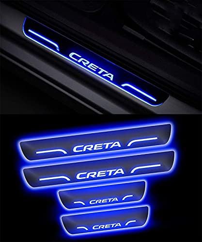 Car door sill with 'CRETA' branding and blue LED lighting on a dark background