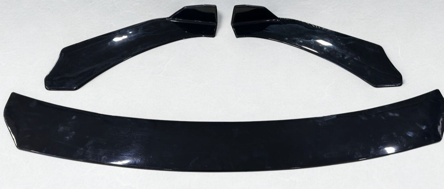 Set of black car spoilers on a white background