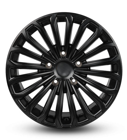 Black car wheel rim on a white background