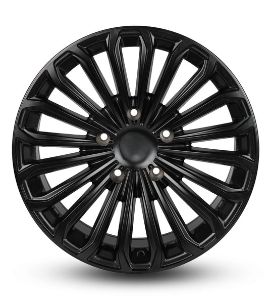 Black car wheel rim on a white background
