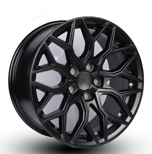 Black alloy wheel on a white background