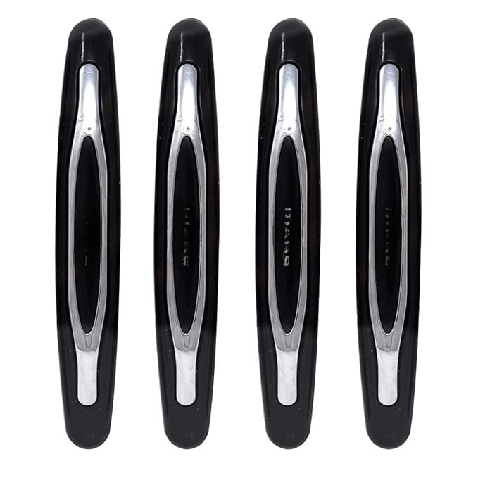 Four black and silver door handles arranged in a row on a white background.