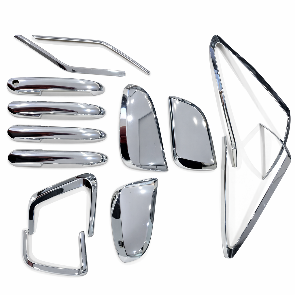 Collection of chrome car accessories on a white background