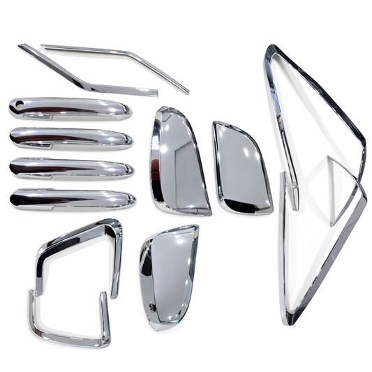 Collection of chrome car accessories on a white background