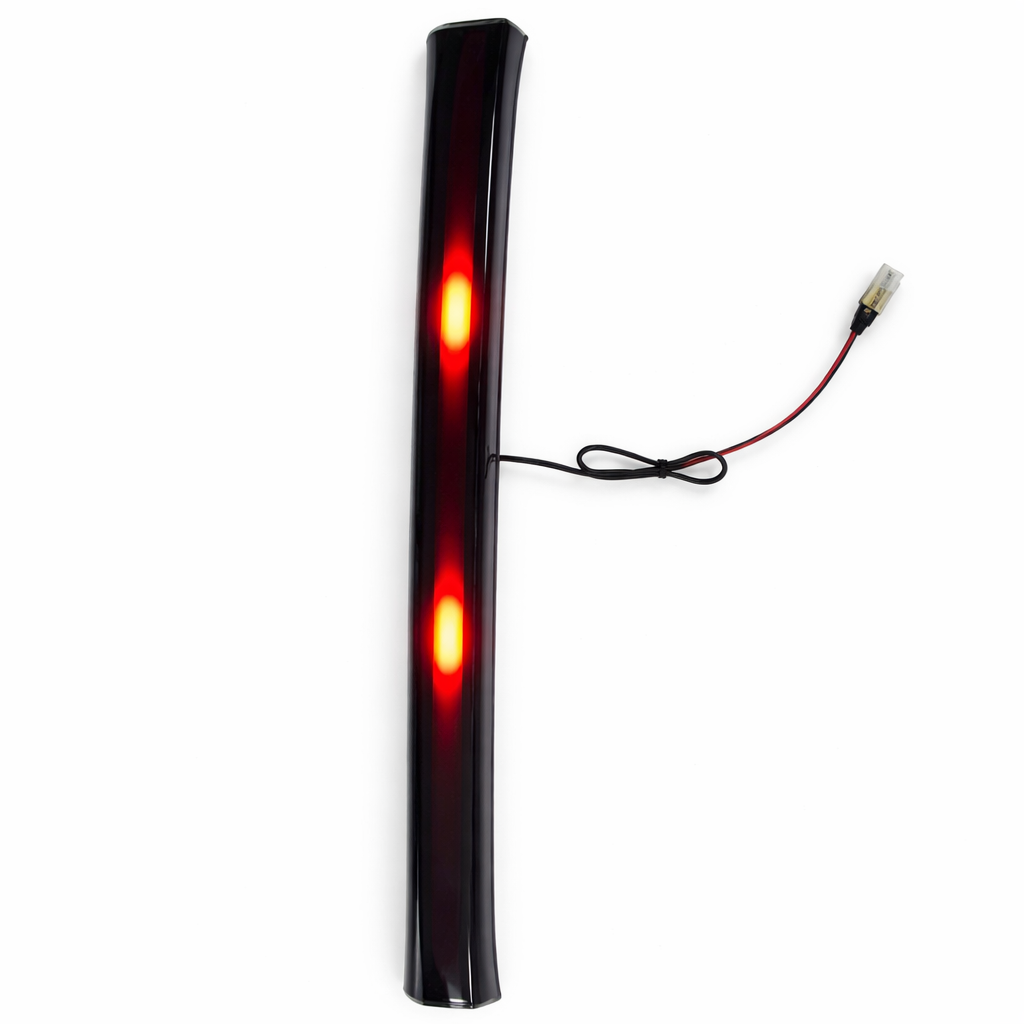 Black LED strip light with red lights on a white background