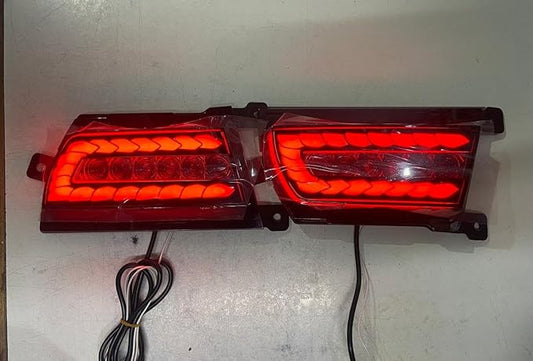 Pair of red tail lights on a white background