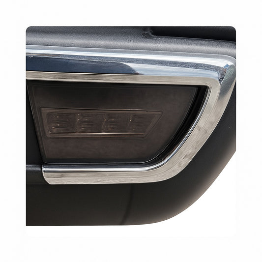 Close-up of a car exhaust with 'SLE' branding on a white background