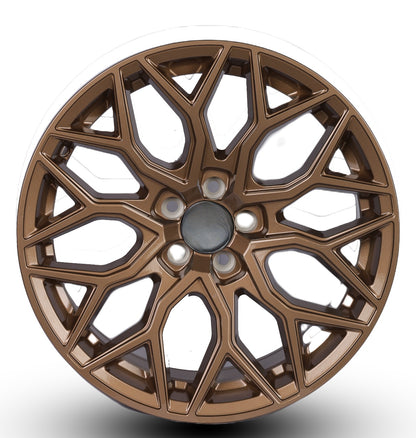Bronze alloy wheel rim on a white background