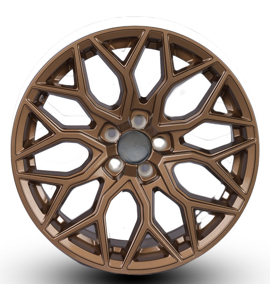Bronze alloy wheel rim on a white background