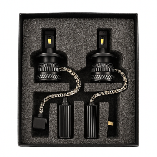 Two car light bulbs in a black box with gray interior