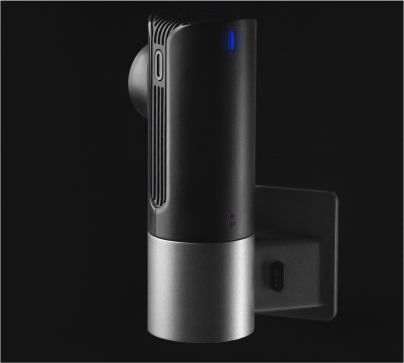Black and silver electronic device on a black background