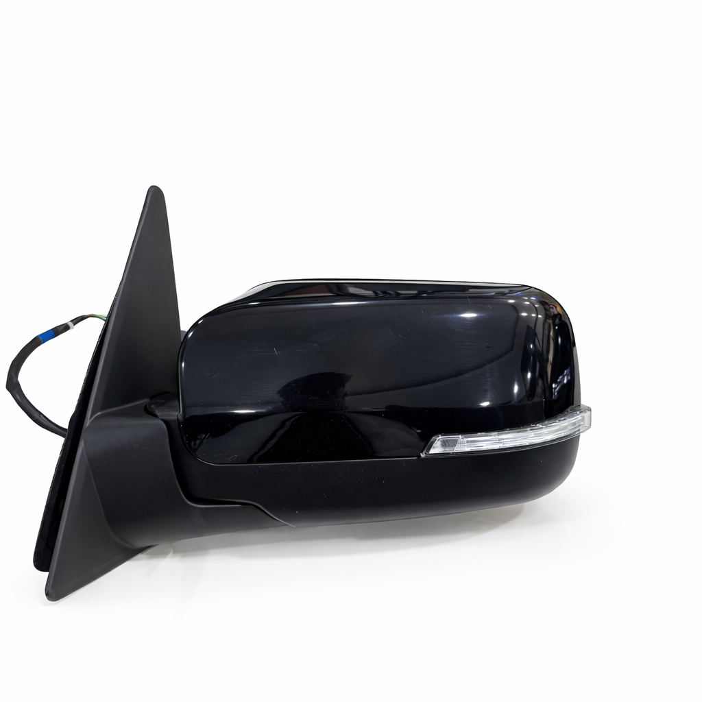 Black car side mirror on a white background