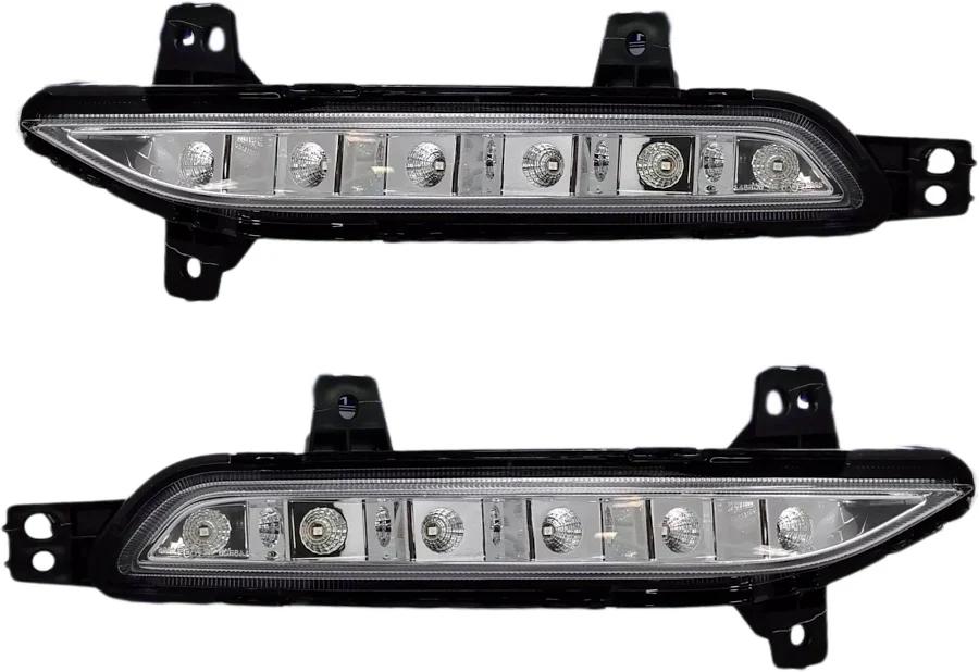 Two car fog lights on a white background