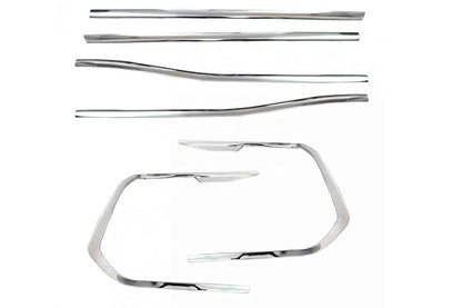 Set of chrome car parts on a white background
