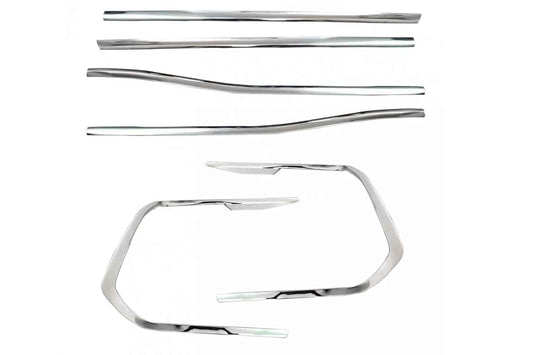 Set of chrome car parts on a white background