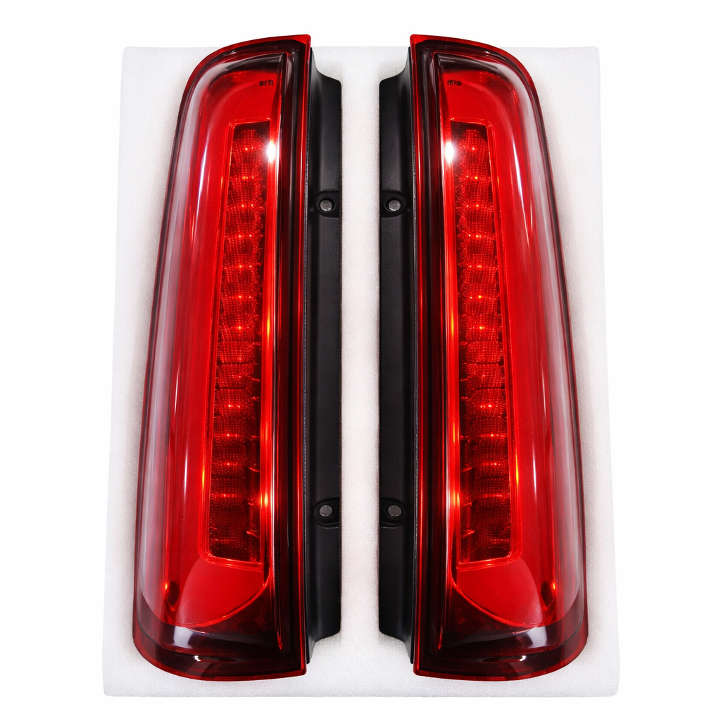 Pair of red car tail lights on a white background