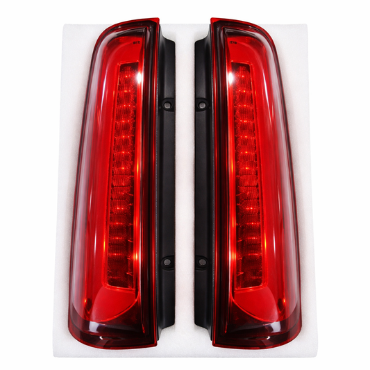 Pair of red car tail lights on a white background
