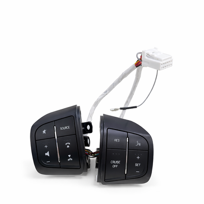 Pair of car control switches with wiring on a white background