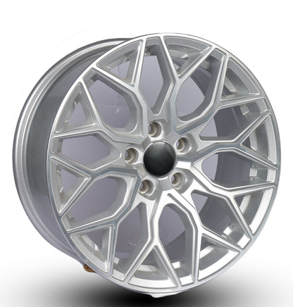 Silver alloy wheel on a white background